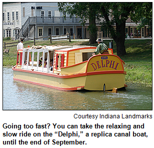 Going too fast? You can take the relaxing and slow ride on the Delphi, a replica canal boat, until the end of September. Image courtesy Indiana Landmarks.