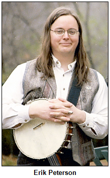 Erik Peterson holding a banjo.