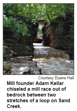 Mill founder Adam Kellar chiseled a mill race out of bedrock between two stretches of a loop on Sand Creek. Courtesy Duane Hall.